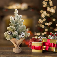 Load image into Gallery viewer, Decorative Christmas scene with a small tree, wrapped gifts, and festive lights.