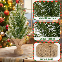 Load image into Gallery viewer, Small artificial Christmas tree with snow-flocked branches and burlap base