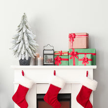 Load image into Gallery viewer, Christmas stockings hanging above a fireplace with presents and mini christmas tree on a mantel.