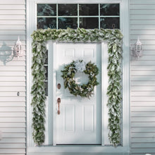 Load image into Gallery viewer, Decorative wreath and Christmas garland on a white front door
