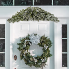 Load image into Gallery viewer, Decorative wreath with a large bow on a white door, with a large Christmas flocked swag above.
